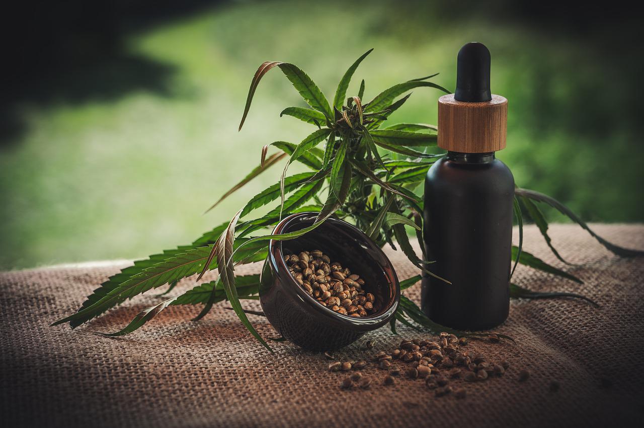 CBD bottle with cannabis leaves